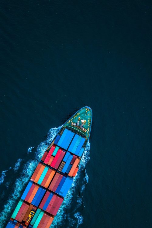 Aerial view from drone, container ship or cargo ship in import export and business logistic.
